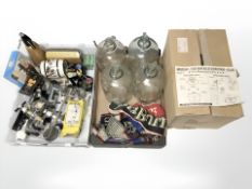 A group of glass demijohns, bar optics soda siphon and similar items.