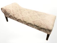 An early 20th century chaise longue in pink floral upholstery, length 181 cm.