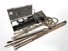 A group of gun cleaning rods, Hoppe's gun cleaning kit,