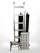 An aluminium extending ladder,