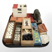 A turned wooden chess set, three sets of dominoes,