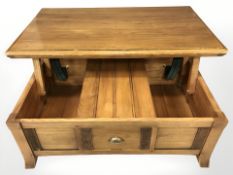 A Winsor Furniture storage coffee table,