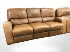A contemporary stitched tan leather manual reclining three seater settee, 214 cm x 95 cm x 95 cm,