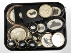 A group of reproduction silhouette miniatures and cameos.