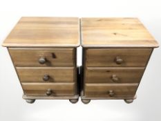 A pair of pine bedside chests,