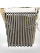 An 800 mm x 600 mm silvered finish radiator, in packaging.