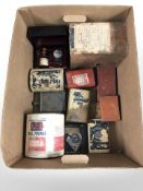 A group of vintage gunpowder tins, together with a Drambuie golf themed gift set.