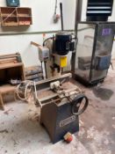 A Sedgwick chisel mortiser, 230v, height 142 cm, width 55 cm, depth 68 cm.