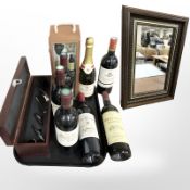 Several bottles of wine, including Chateaux Roc Meynard and Chateaux Romefort,