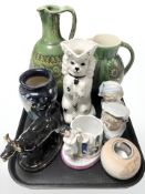 A group of Earthenware jugs, pair of continental porcelain busts, cow creamer,