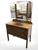 An Edwardian oak two drawer mirror back dressing chest, 92 cm x 44 cm x 154 cm.