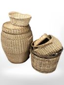 A wicker hamper, height 62 cm, and several baskets.