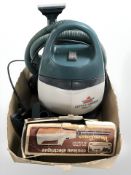 A Bissell floor cleaner and an electric knife.