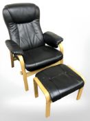 A contemporary Scandinavian stained bentwood black leather chair with matching stool.