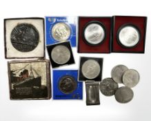 A re-strike Lusitania medal, assorted crowns, German badge, two Montreal Olympics 1976 $5 coins,