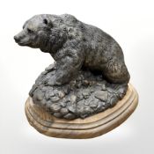 A bronze-effect sculpture of a grizzly bear on plinth, height 17 cm.