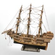 A very large model of a three-masted battleship, 152 cm x 147 cm x 42 cm approximately.