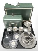 Two metal cash tins, pewter tankards, stainless steel tea light holders, magnifying glass, etc.