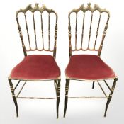 A pair of brass occasional chairs
