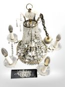 A gilt brass chandelier with crystal droplets.