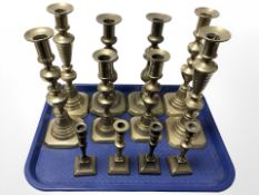 Six pairs of Victorian brass candlesticks, tallest 25 cm.