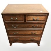 An Edwardian mahogany and satinwood inlaid five drawer chest, 61 cm x 40 cm x 75 cm.