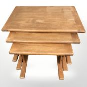 A G-plan teak nest of three tables,