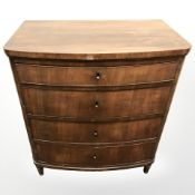 A 19th century Continental mahogany bow fronted four drawer chest,