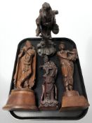 Four oriental hardwood figural carvings, tallest 37 cm.