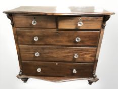 A Victorian mahogany five drawer chest with glass handles,