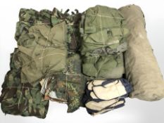 A large quantity of military surplus clothing and similar items.