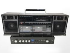 A Realistic Modulaire 1000 portable stereo and a Sonic III amplifier.
