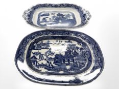 Two blue and white willow pattern meat plates, largest 46 cm wide.