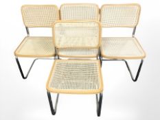 A set of four cantilever chairs.