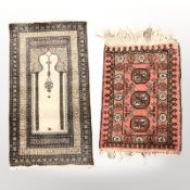 An Anatolian prayer rug, 106 cm x 59 cm, and a small Turkoman rug, Afghanistan,