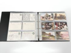 An album containing approximately 252 antique and later postcards, oilettes, Rafael Tuck, etc.