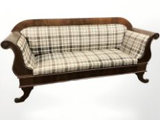 An early 20th century Continental scroll arm settee,