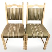 A pair of Danish blond oak dining chairs in striped upholstery