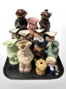 A collection of Toby and character jugs.
