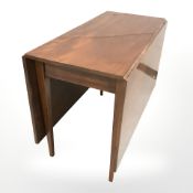 A 19th century mahogany gateleg drop leaf dining table,