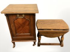 A reproduction oak drop leaf occasional table and a late Victorian coal receiver