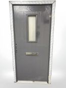 A Eurocell grey double glazed front door, total dimensions including frame 101.