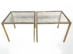 A pair of brass and bevelled glass lamp tables, width 50 cm.