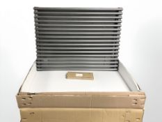 A 600mm x 600mm grey metallic radiator