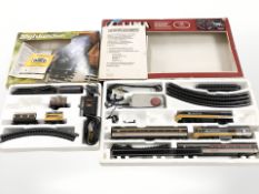 A Lima OO gauge train set and a further Hornby Highlander train set.