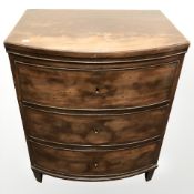 A 19th century Continental mahogany bow fronted three drawer chest,