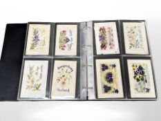 An album containing approximately 136 First World War silk postcards.