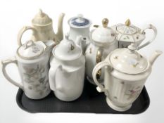 Seven various continental porcelain tea pots.