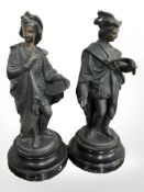 A pair of 19th century patinated spelter figures depicting an artist and a scholar, height 25.5 cm.