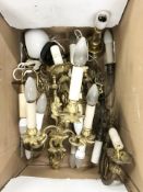 A group of continental brass wall sconces.